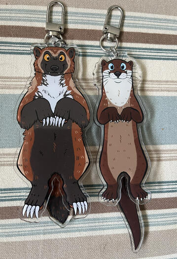 Wolverine and otter tail-wagging charms.