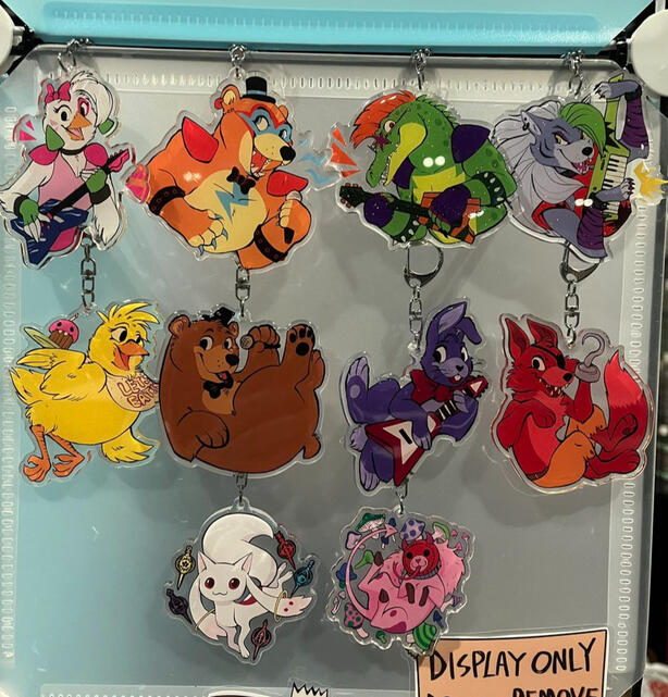 An assortment of colorful animal acrylic charms.